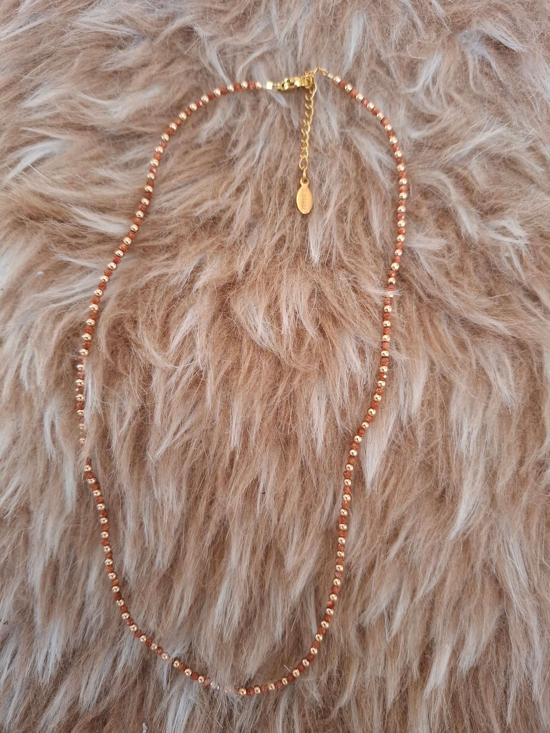 Gouden zandsteen goudkleurige ketting