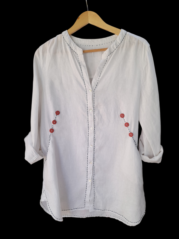 linen tunic , red buttons and detail
