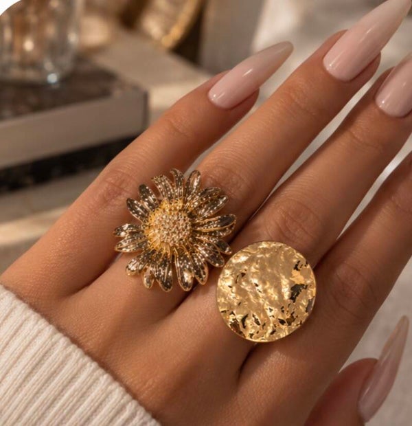 The Sculpted Bloom & Hammered Disc Adjustable Ring Set