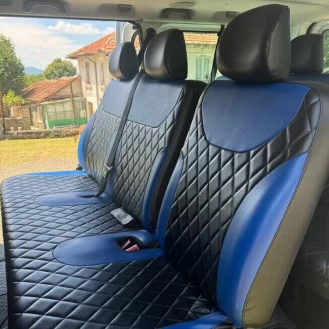 White minibus with black and blue seats