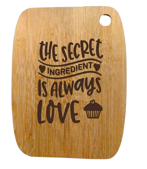 "The secret ingrediënt is always love" - Bamboo snijplank