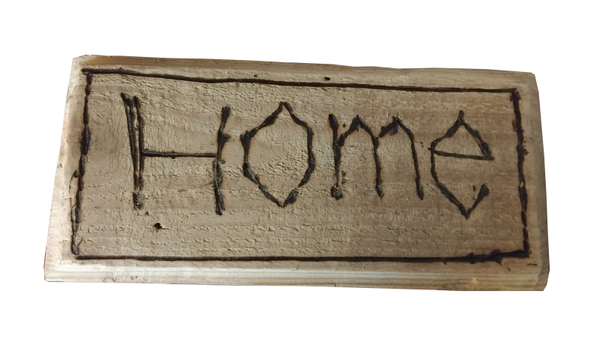 Puupoltettu “Home” -kyltti