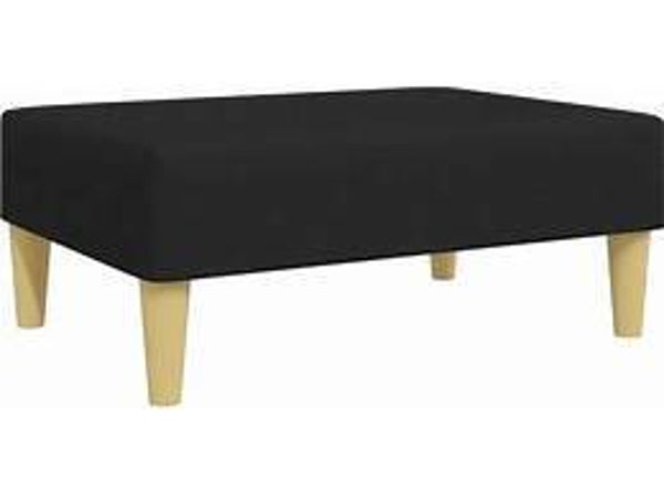 Black upholstered footstool