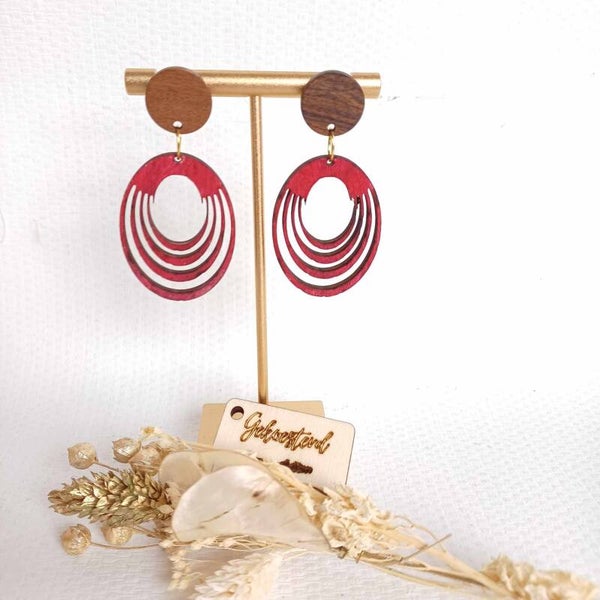 Diep rozerode oorstekers