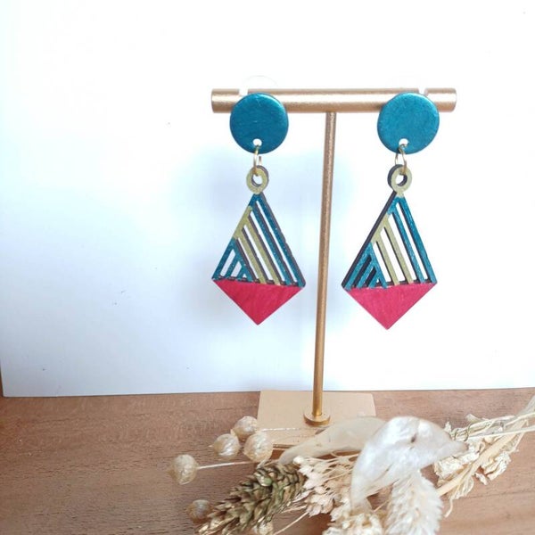 Houten petrolkleurige oorsteker