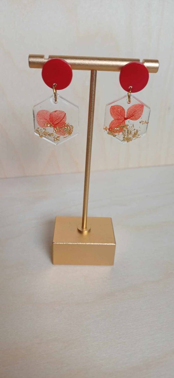 Rode bloem oorsteker