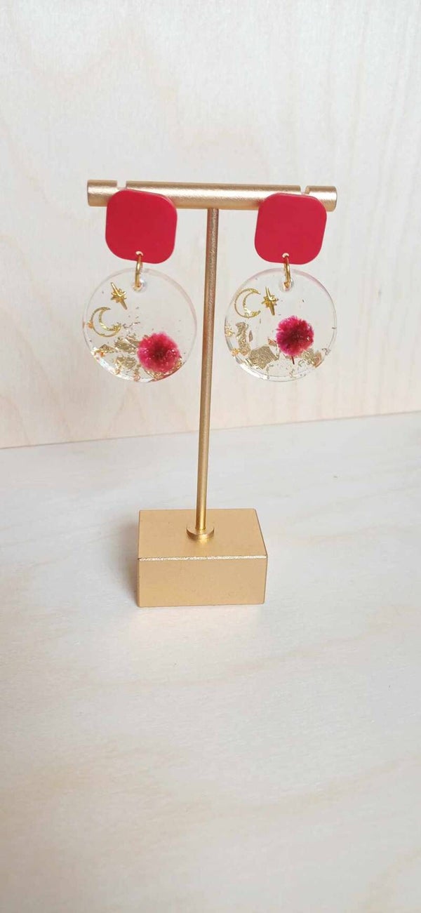 Rode oorbel met maan