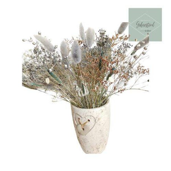 Romantische vaas met droogbloemen in grijstinten