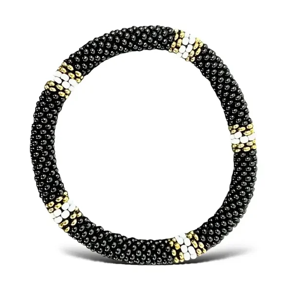 Nepalese zwarte armband met witgouden ringen
