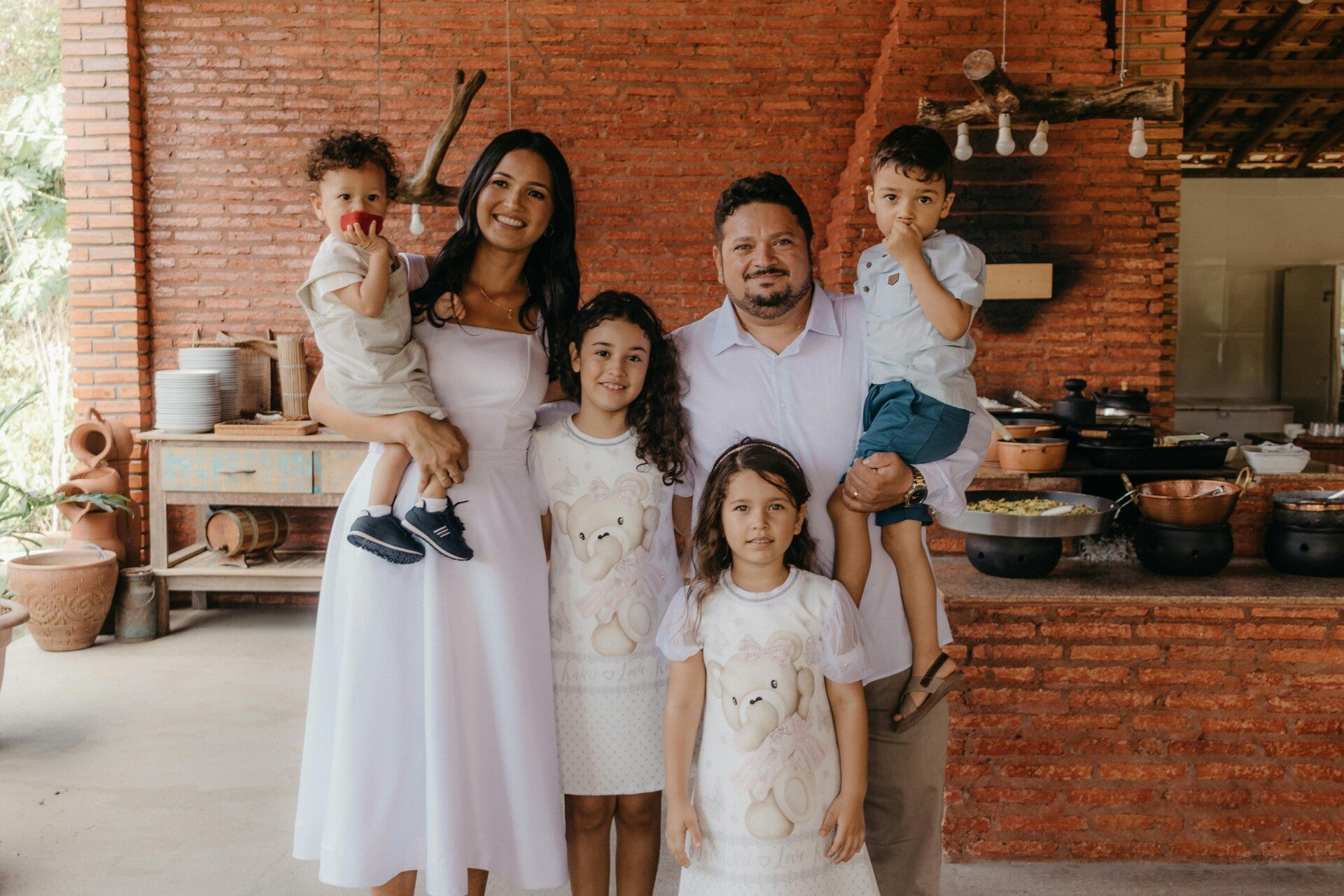 A happy multi-generational blended family posing together, representing the comprehensive estate planning services provided by Claim My Legacy for families in Sun City, Arizona.
