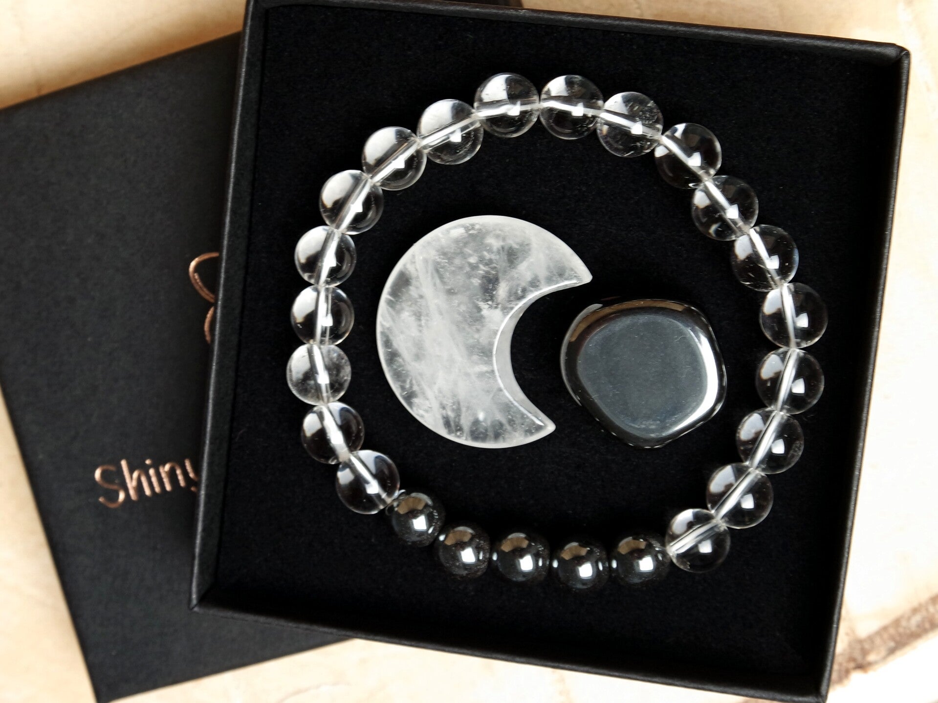 Edelsteen-set Yin Yang - met maan van bergkristal en steen van hematiet