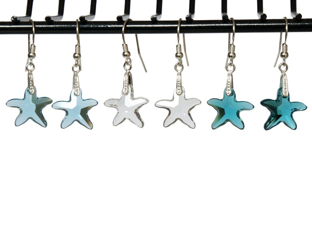 Zilveren oorbellen met Swarovski®-zeesterren