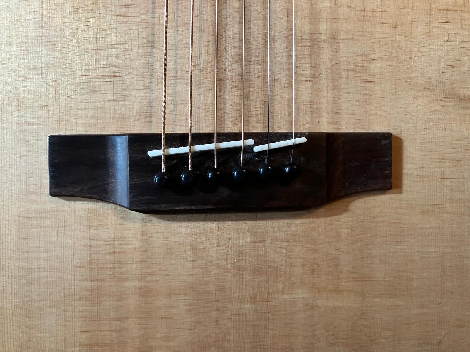 Bone split saddle in Brazilian Rosewood bridge on Dirondack spruce soundboard