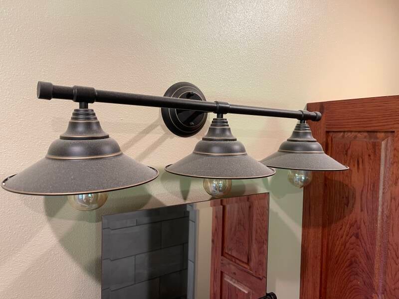 before photo of dusty bathroom lights 