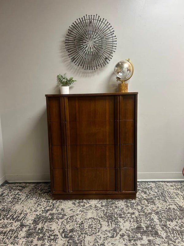 midcentury 4 drawer dresser with unique drawer pulls made by Bassett