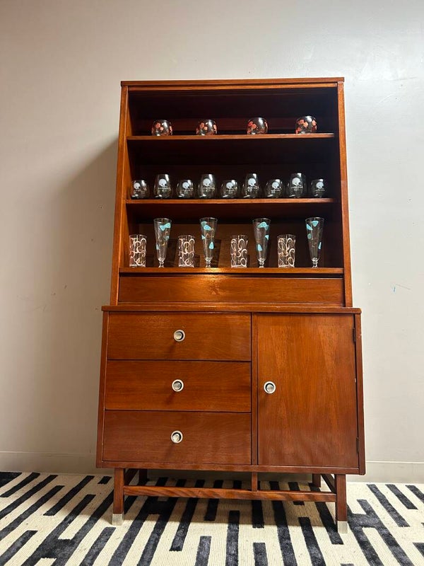 midcentury sliding glass door display case with atomic pulls made by Stanly.