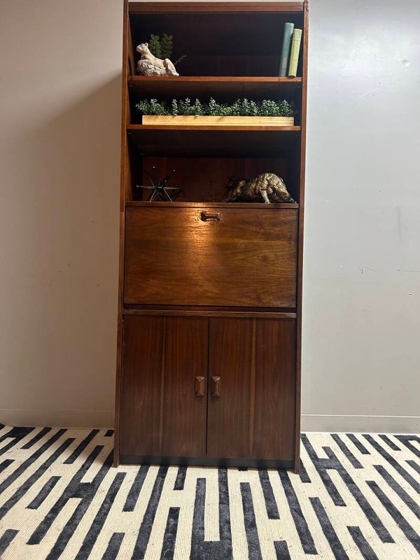 midcentury standing walnut bookcase with desk.