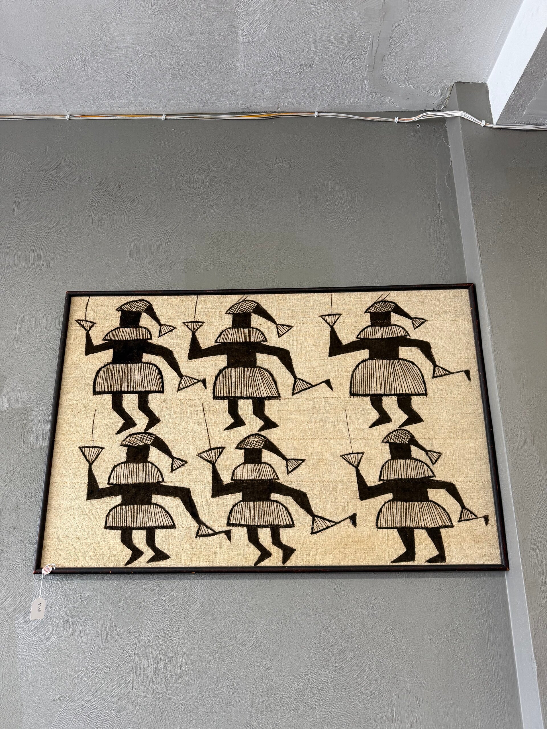 Senufo Korhogo tapestry from the Ivory Coast, featuring hand-painted figures on hand-woven cotton fabric