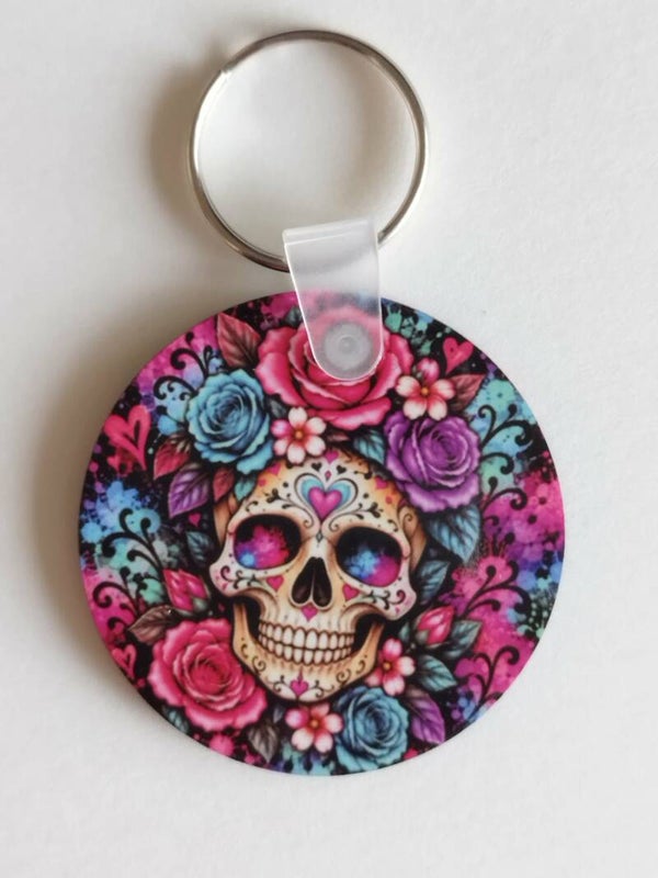 Porte-clés rond tête de mort fleurie