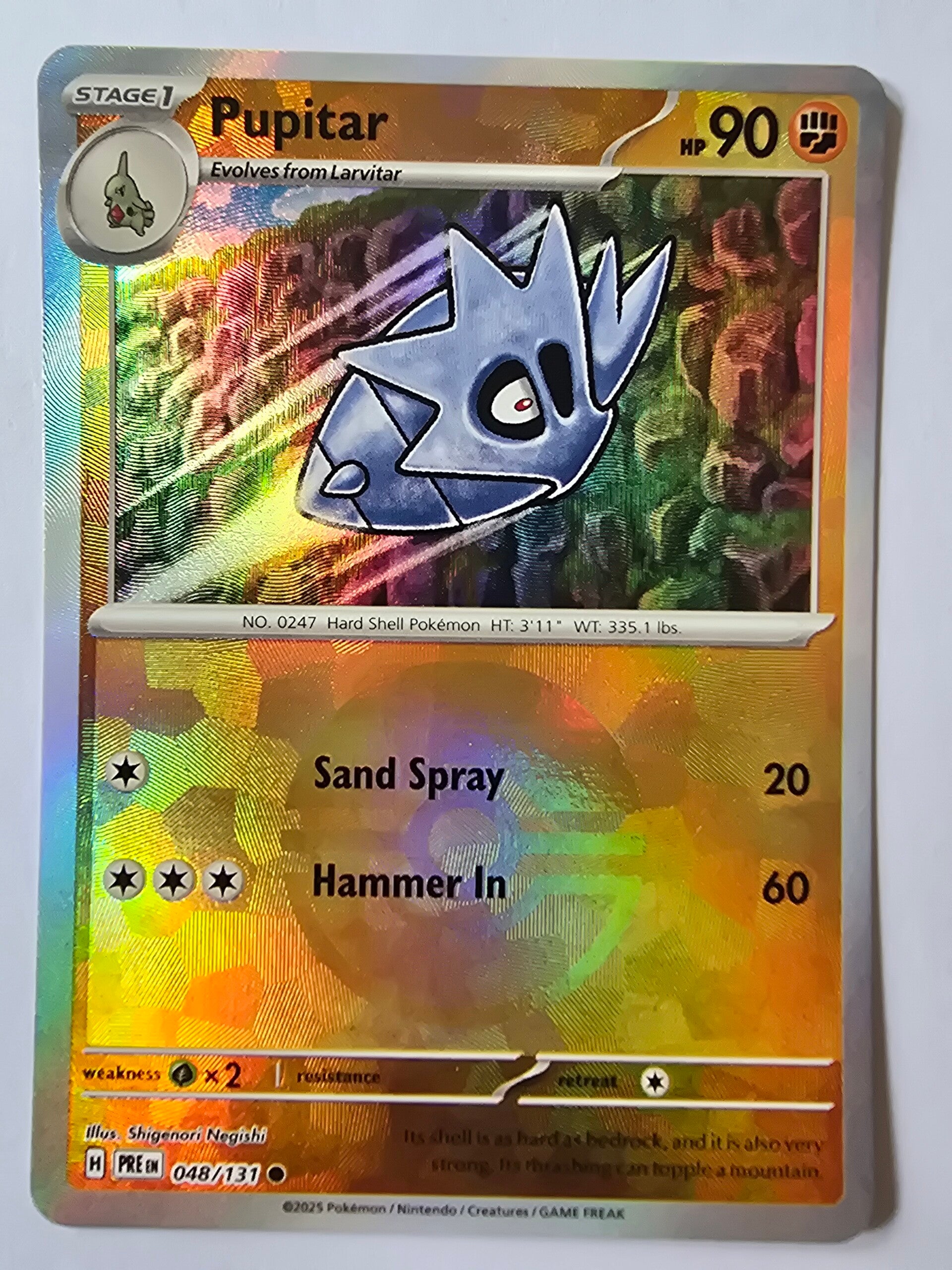 PUPITAR (PRISMATIC EVOLUTIONS 048/131) (POKÉ BALL HOLO) (TRADING CARD)