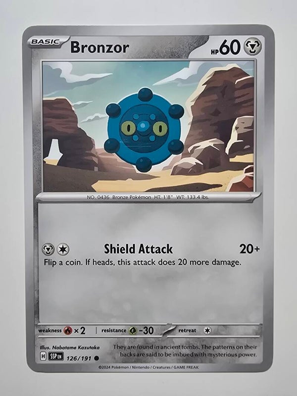 BRONZOR (SURGING SPARKS 126/191) (TRADING CARD)
