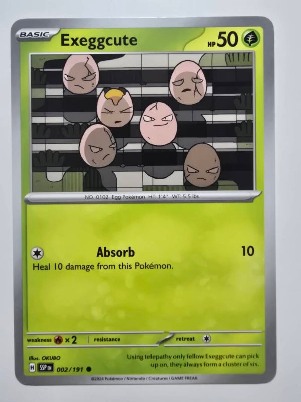 EXEGGCUTE (SURGING SPARKS 002/191) (TRADING CARD)