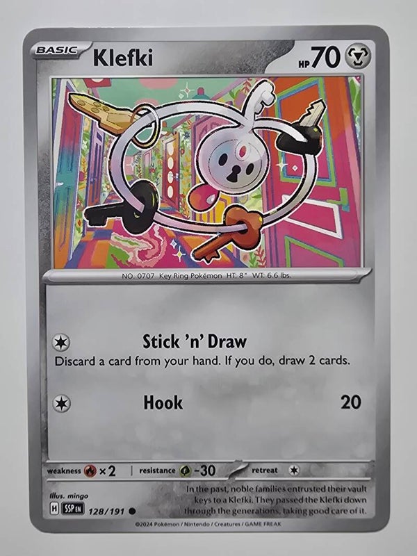 KLEFKI (SURGING SPARKS 128/191) (TRADING CARD)
