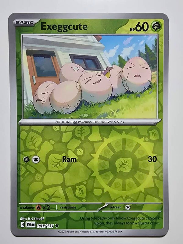 EXEGGCUTE (PRISMATIC EVOLUTIONS 001/131) (REVERSE HOLO) (POKÉMON) (TRADING CARD)