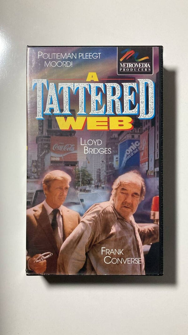 A TATTERED WEB (VHS)