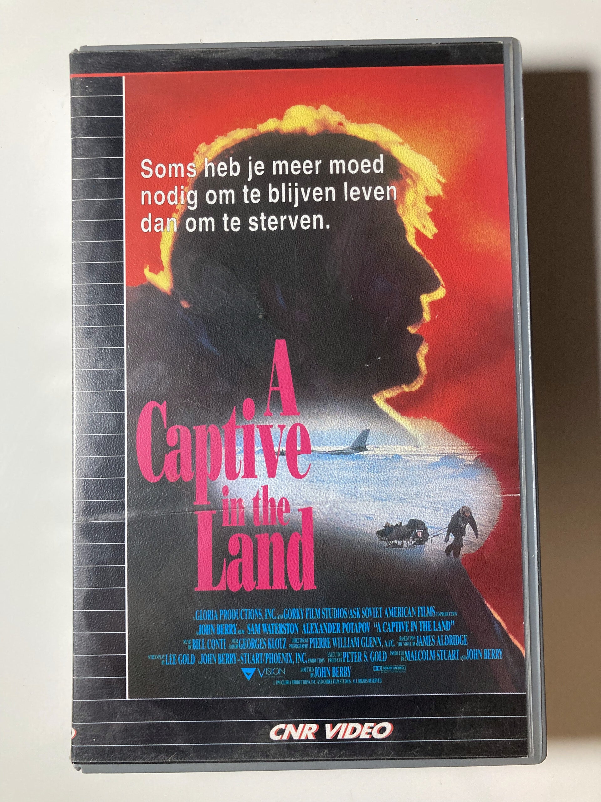 A CAPTIVE IN THE LAND (EX RENTAL) (VHS)