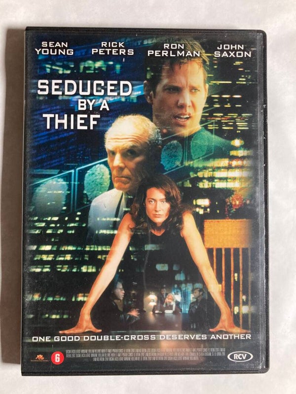 SEDUCED BY A THIEF (DVD)