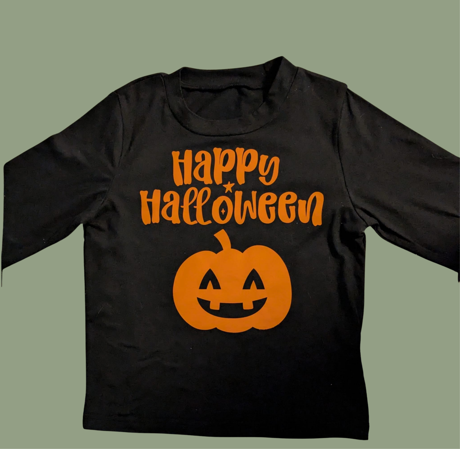Happy halloween t-shirt. Personalised with name. Available in short or long sleeved