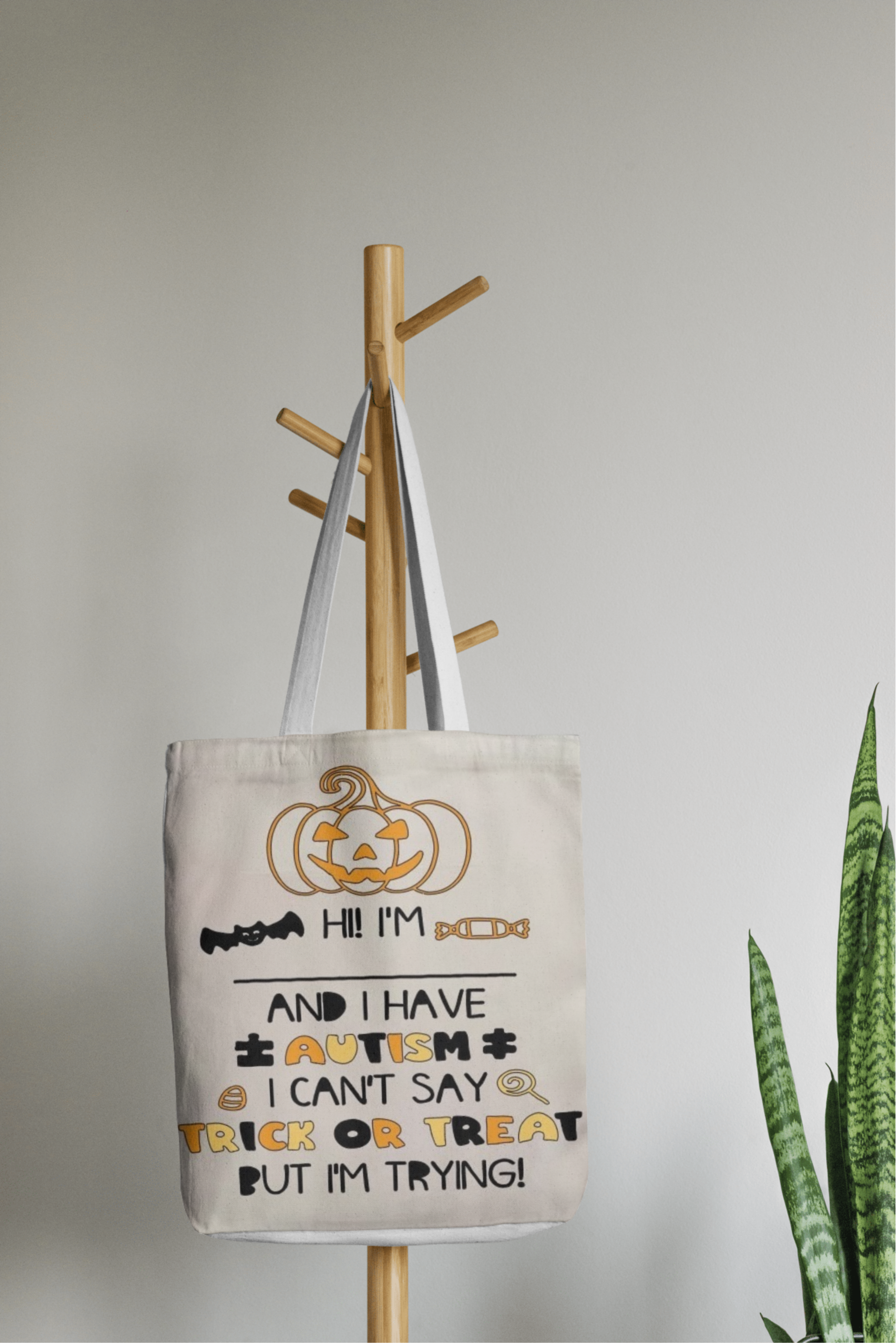 Halloween trick or teat autism canvas tote bag