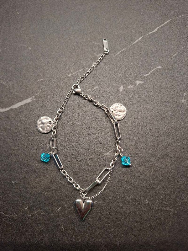 Schakelarmband met blauwe accenten