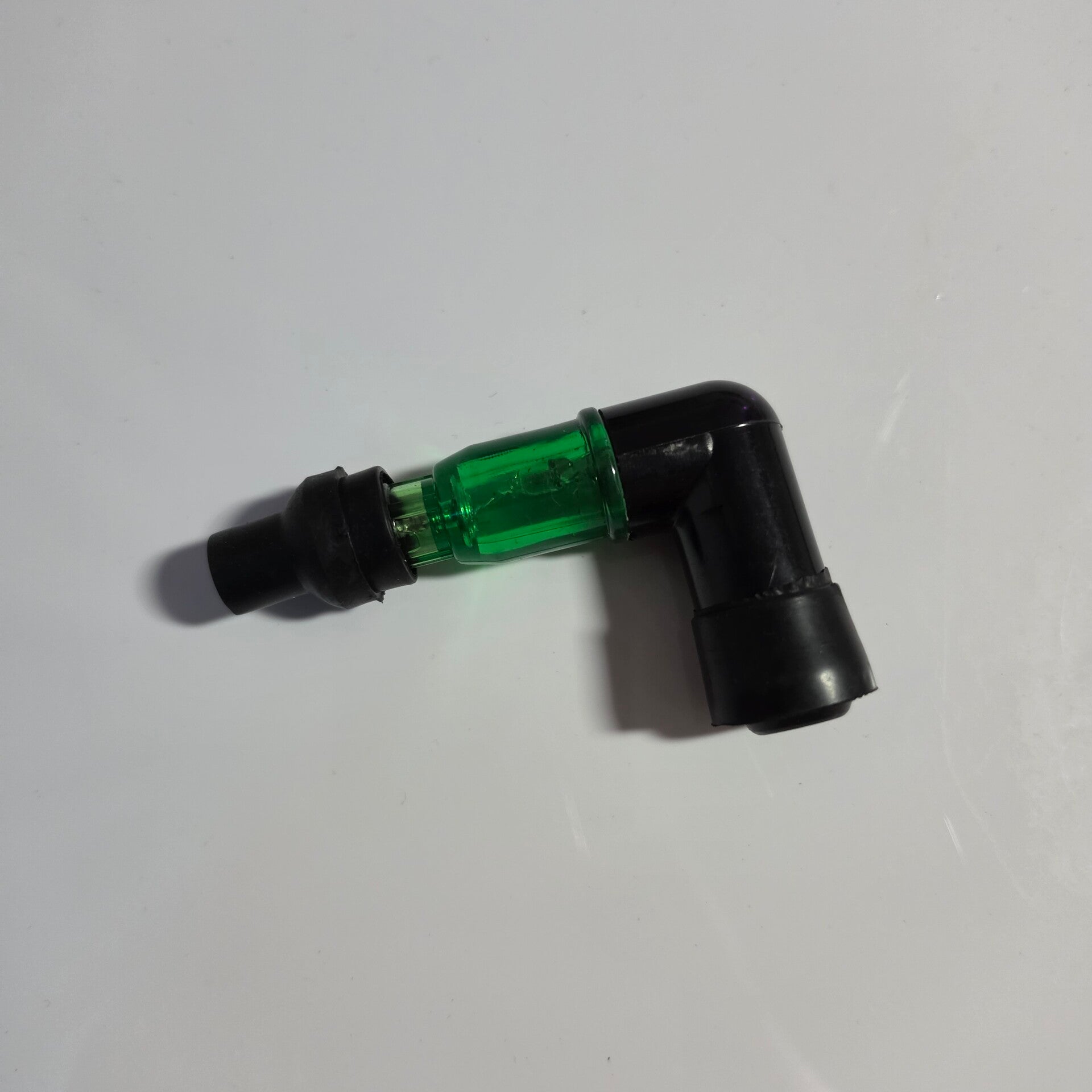 Zündkerzenstecker leuchtend Grün