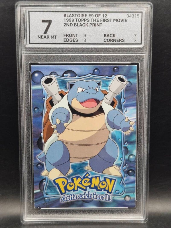 Blastoise 1999 topps the first movie #e9 woetoe grading 7