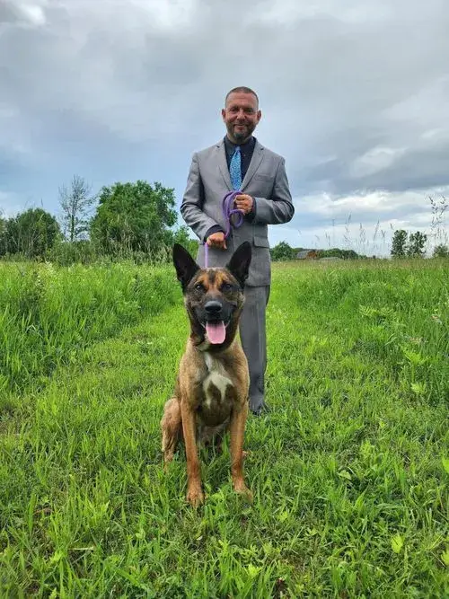 AAO Founder Matt Albert with one of the dogs in hise care.