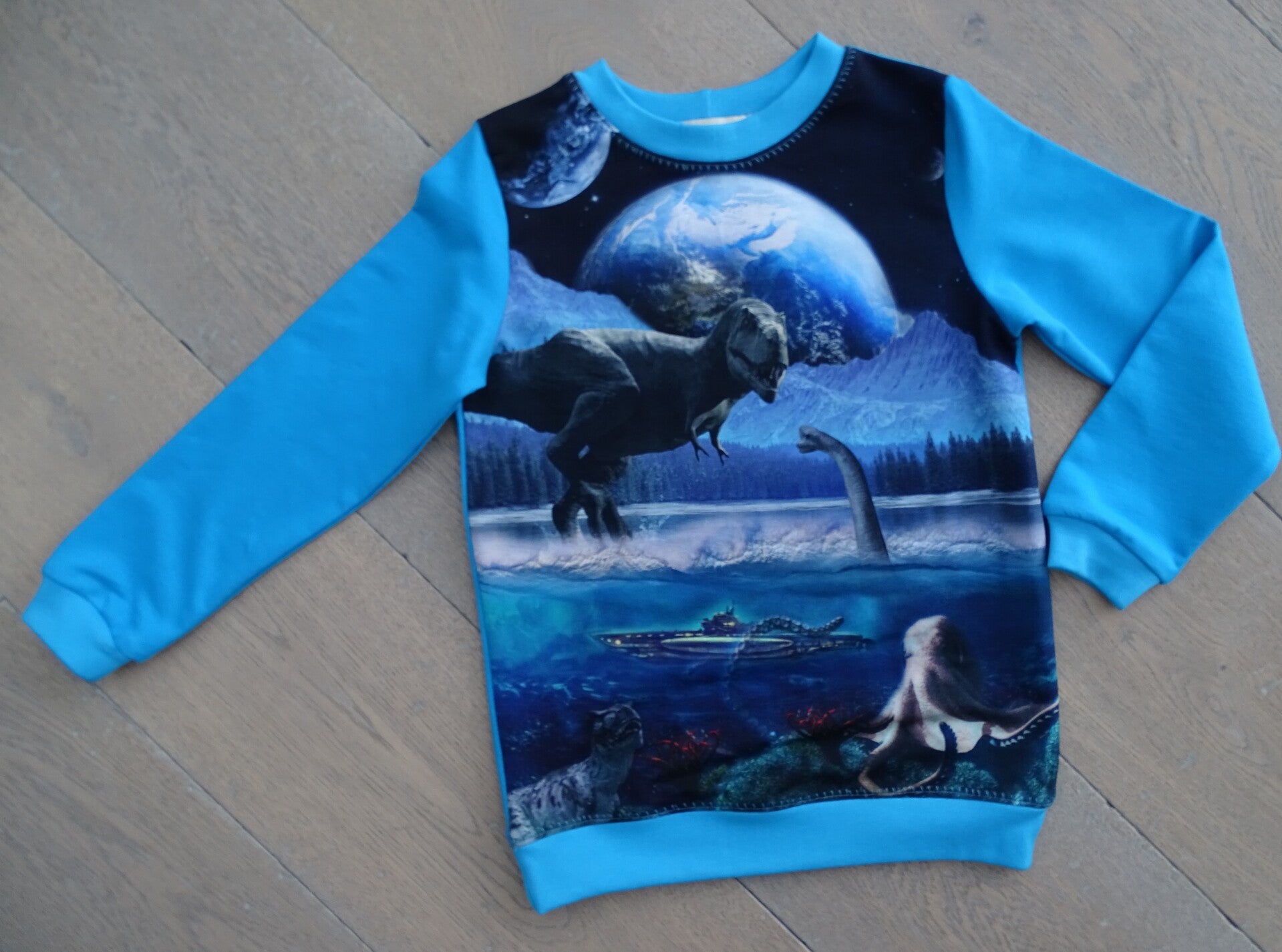 sweater dino blauw maan