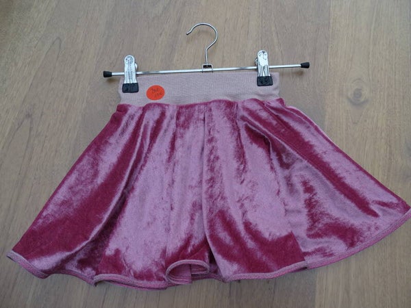 zwierrokje fluweel roze stock