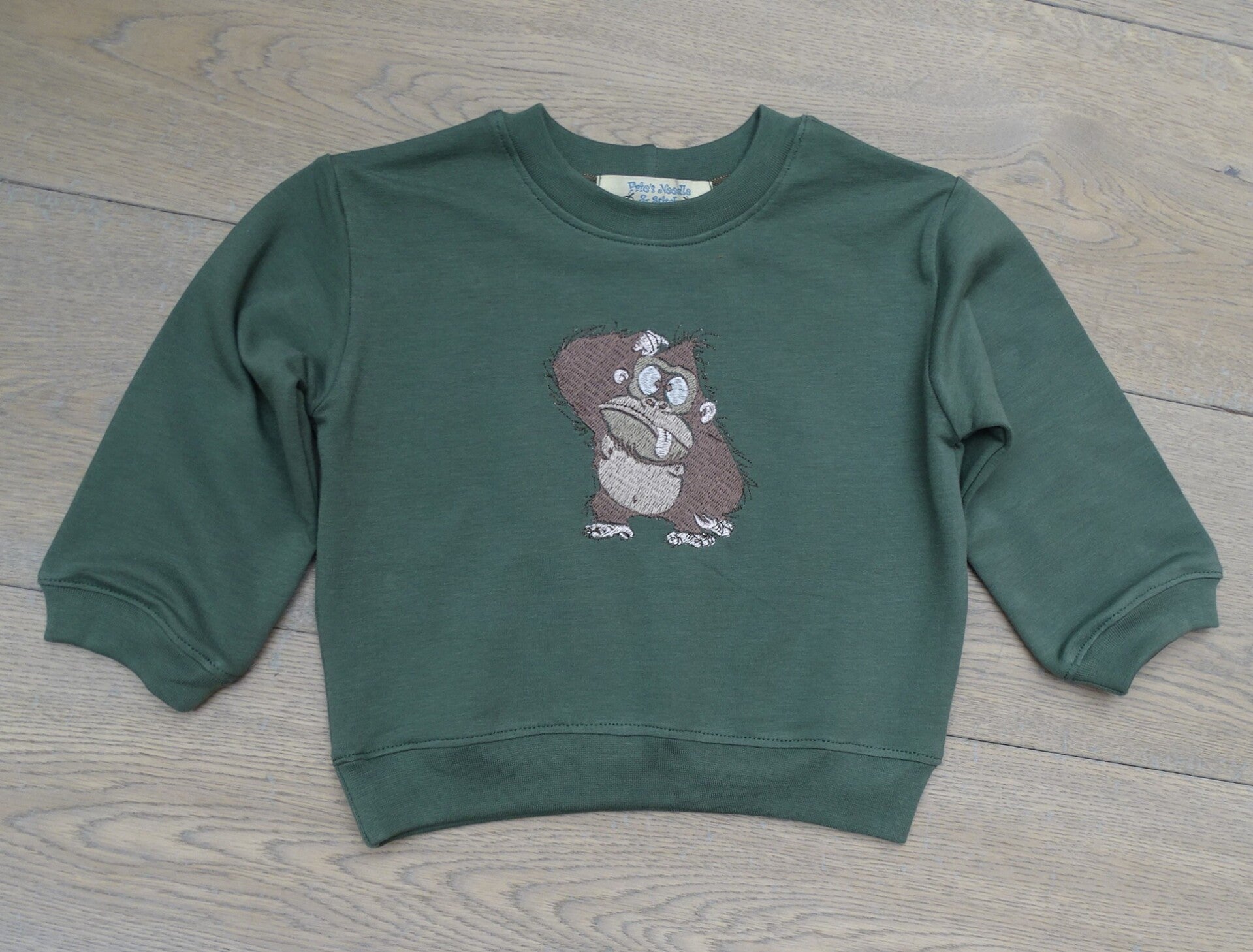 sweater uni kakigroen borduur gekke aap