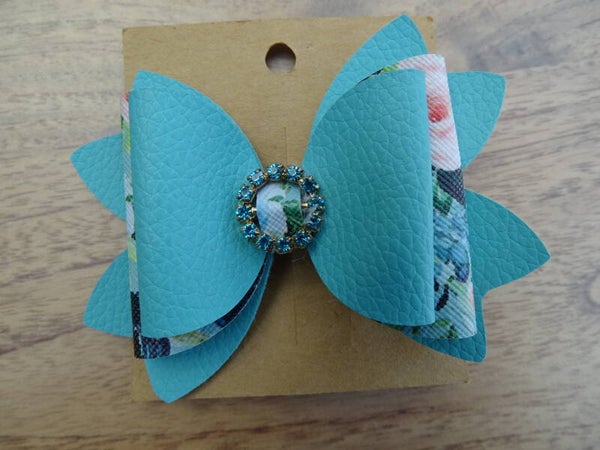 Haarspeld strik turquoiseblauw bloemen, steentjes