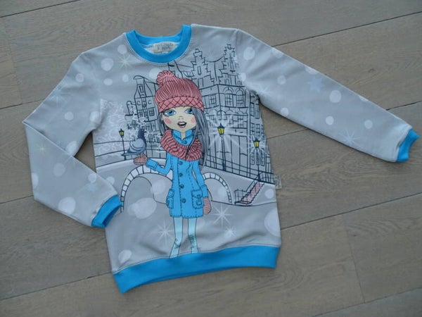 sweater meisje blauwe jas