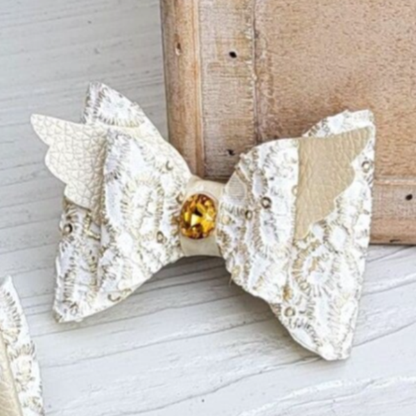 Strik goud/beige vleugels steen