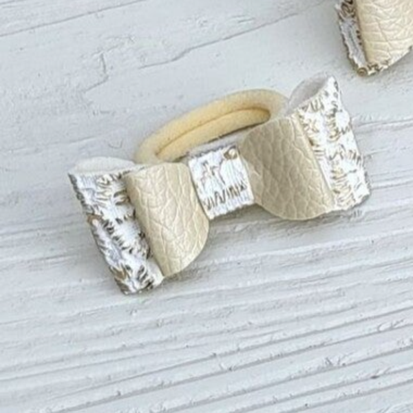 Strik elastiek goud/wit mini