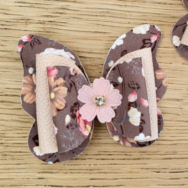 Haarspeld strik bruin/roze bloemen