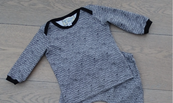 baby zwartgrijs krul