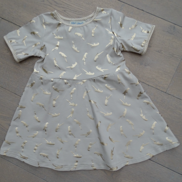 Jurk baby beige papegaai, korte mouw
