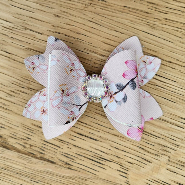 Haarspeld strik roze lentebloemen, steentjes