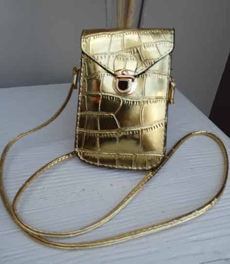 Handtasje goud glans