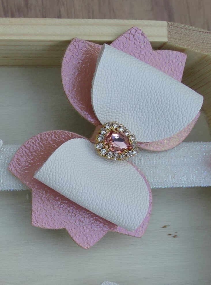 Haarspeld strik wit/roze steentje